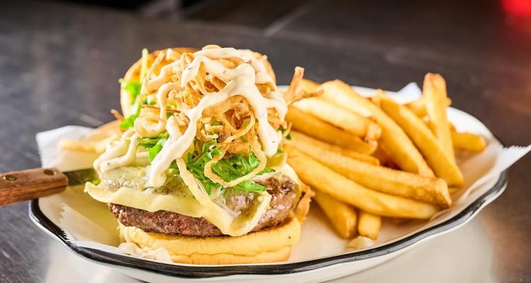 Indulge in the Best Gourmet Burgers and Fries at Black Tap Craft Burgers and Beer