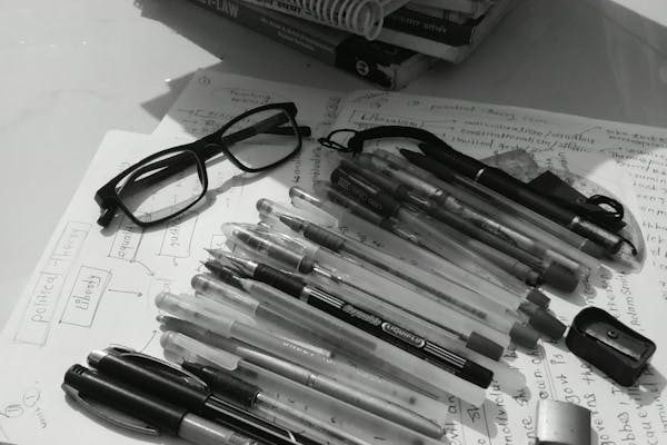 free-photo-of-monochrome-study-desk-with-books-and-stationery