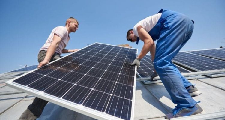 installing-solar-photovoltaic-panel-system-on-roof-2022-05-16-16-02-46-utc