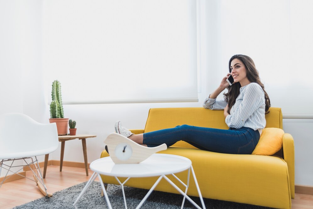 young-worker-resting-talking-phone_23-2147604983