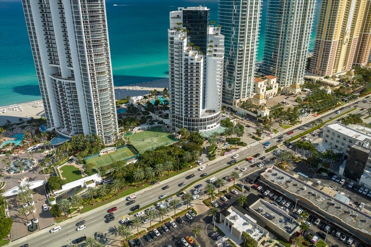 aerial-view-sunny-isles-beach-city-with-congested-street-traffic-luxurious-highrise-hotels-condos-atlantic-ocean-shore-american-tourism-infrastructure-southern-florida_1029239-7651