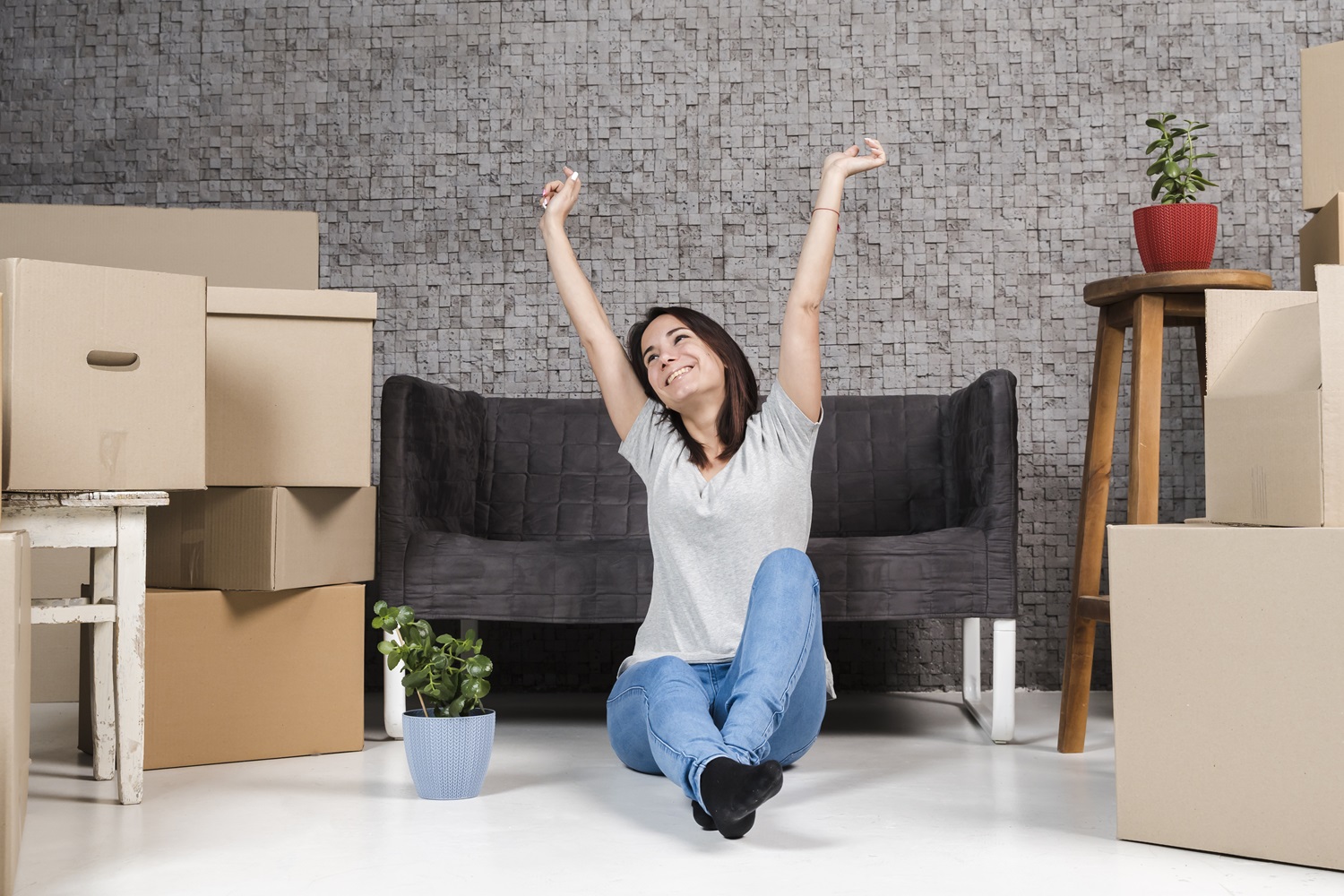 portrait-young-woman-celebrating-relocation