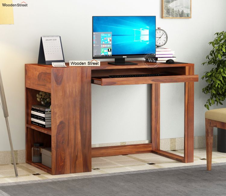 Upgrade your workspace with modern, ergonomic, and stylish computer tables from WoodenStreet.1