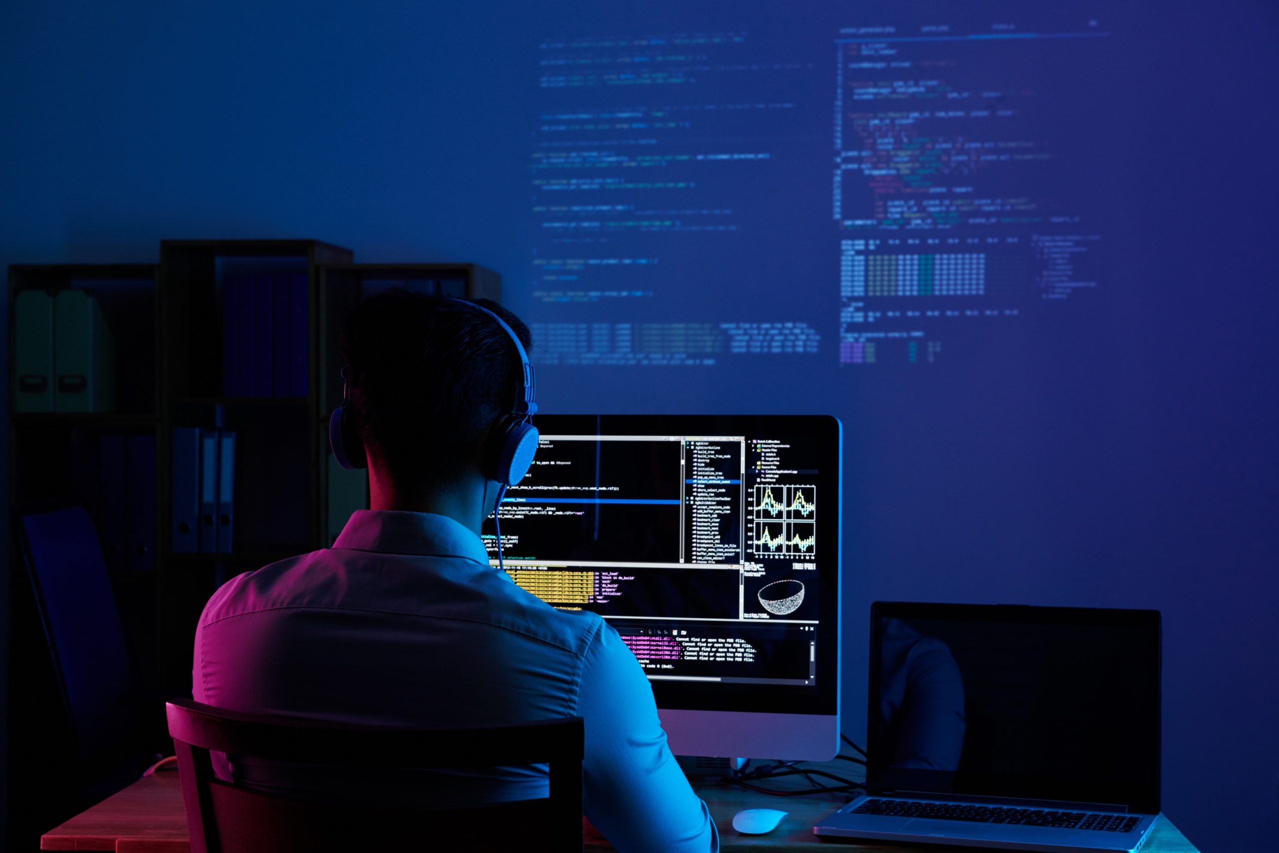 rear-view-programmer-working-all-night-long (1) (1)