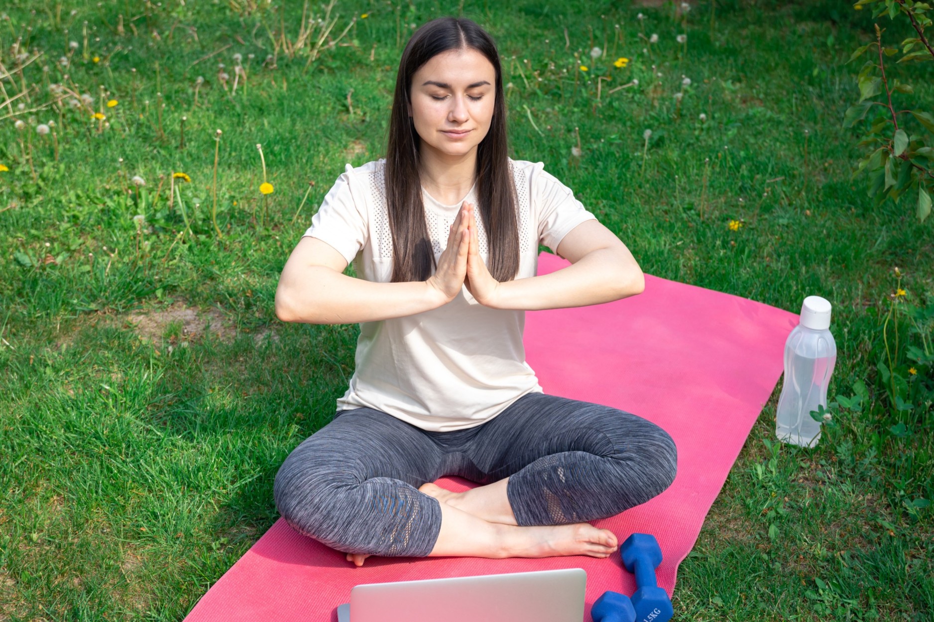 woman-meditates-sits-front-laptop-rug-park (2) (1) (1) (1)